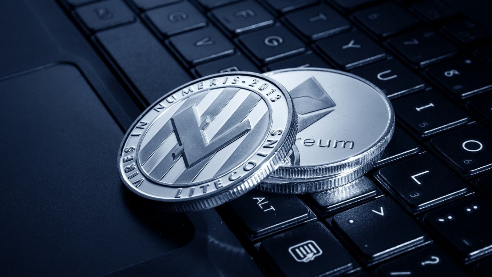 Cryptocurrency Coins On Laptop
